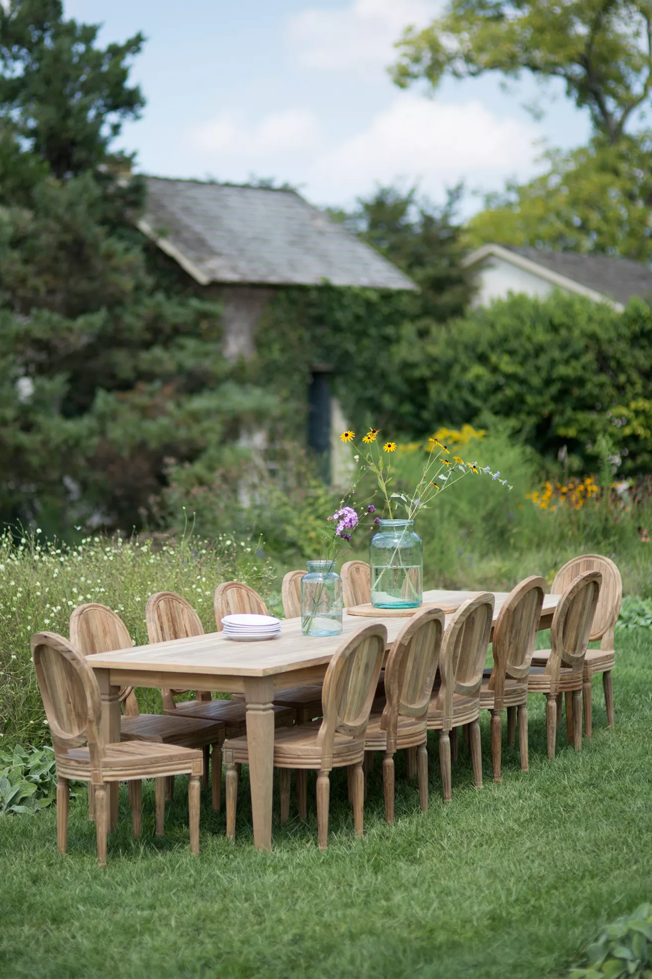 Indoor rustic dining table with oval-back chairs