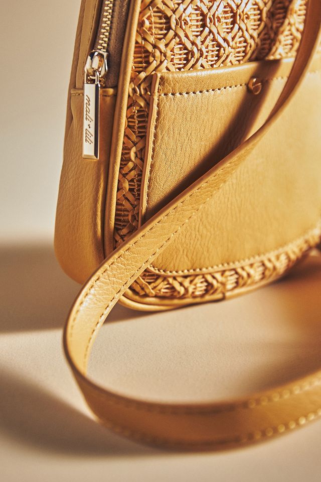 Mali Beautiful cross-body leather bag. Has braided leather straps