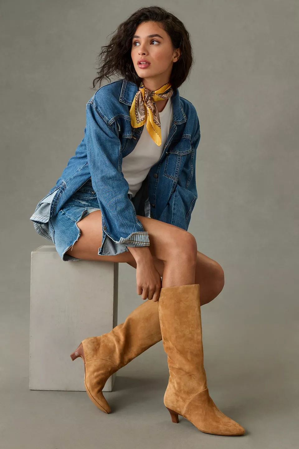 Tan boots with denim jacket and white tee outfit