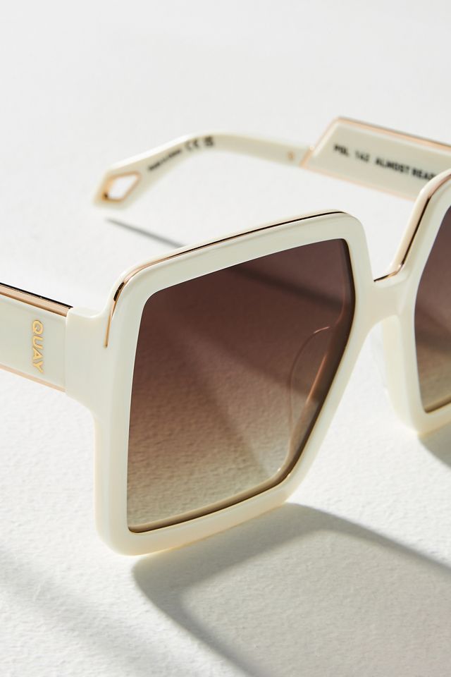 QUAY Almost Ready Polarized
Sunglasses Ivory Frame Brown Gradient
Lens Quay Almost Ready square sunglasses with polarized brown  main image 4