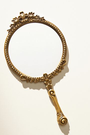 The Gleaming Primrose Hand Mirror