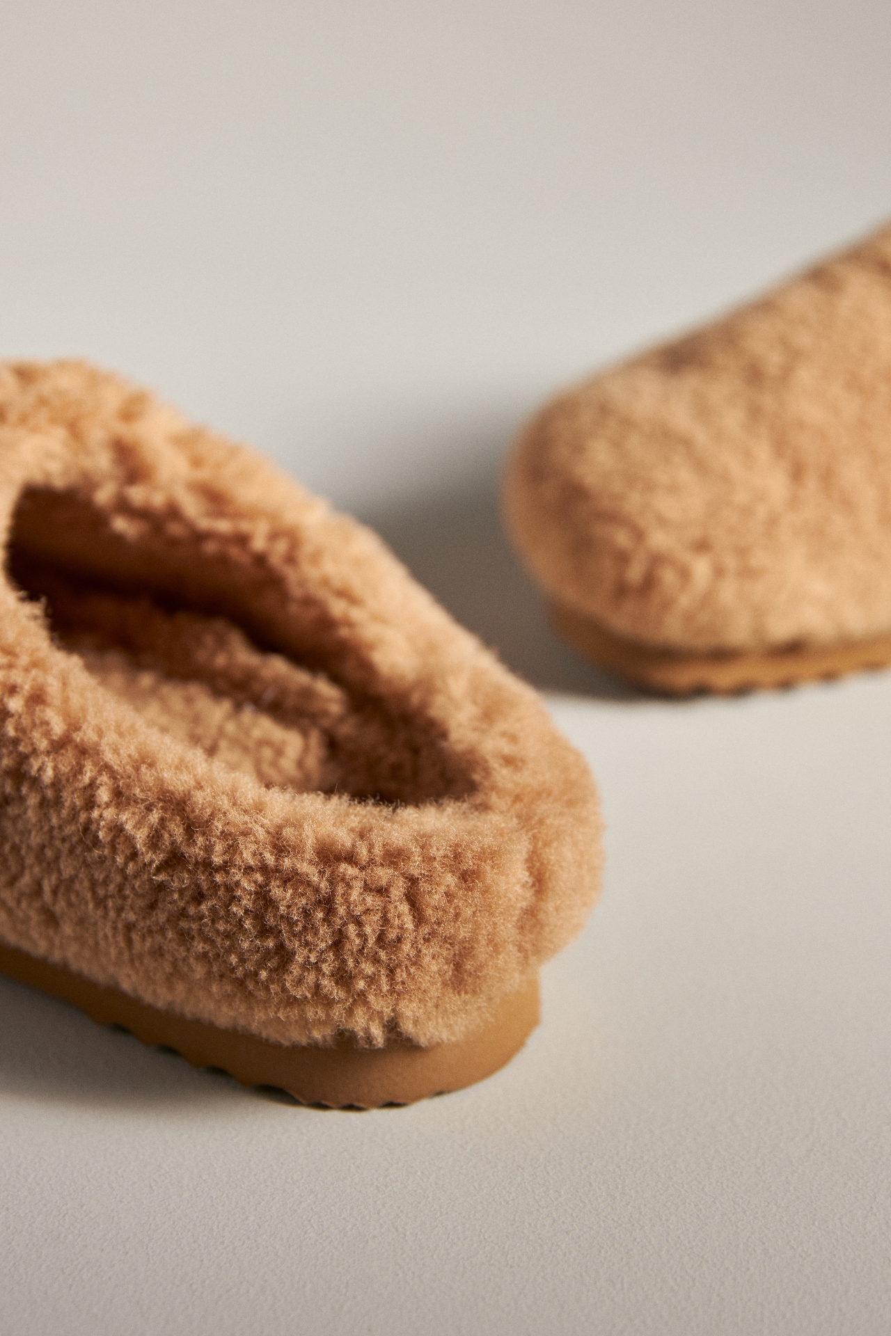 By Anthropologie Sherpa Slippers