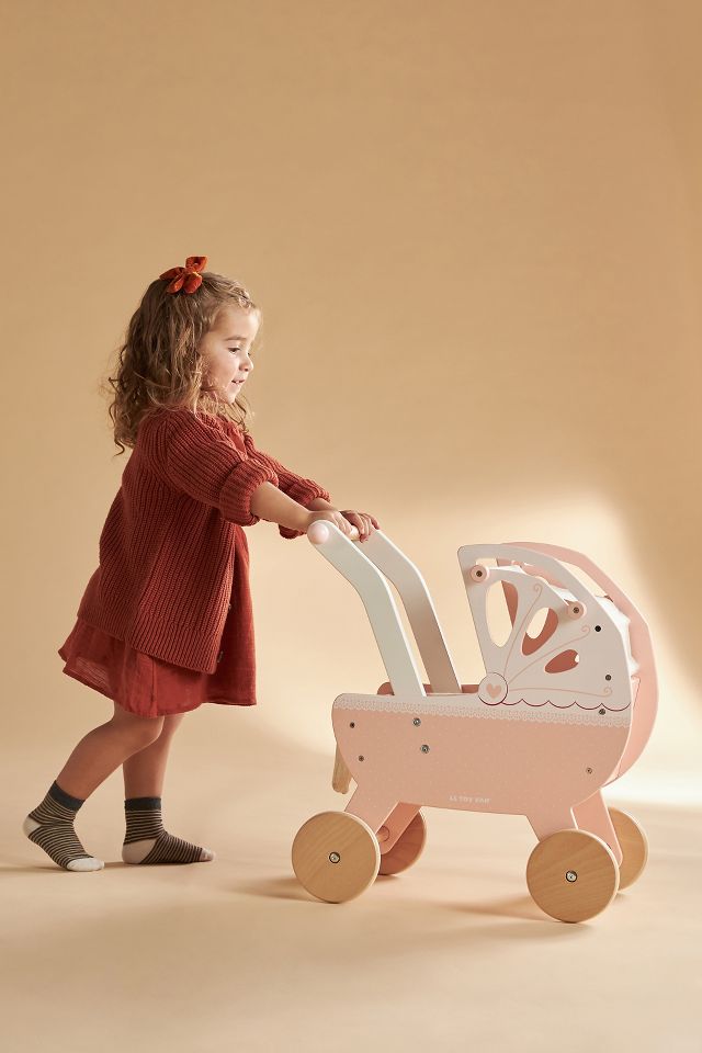 Toy pram outlet and doll