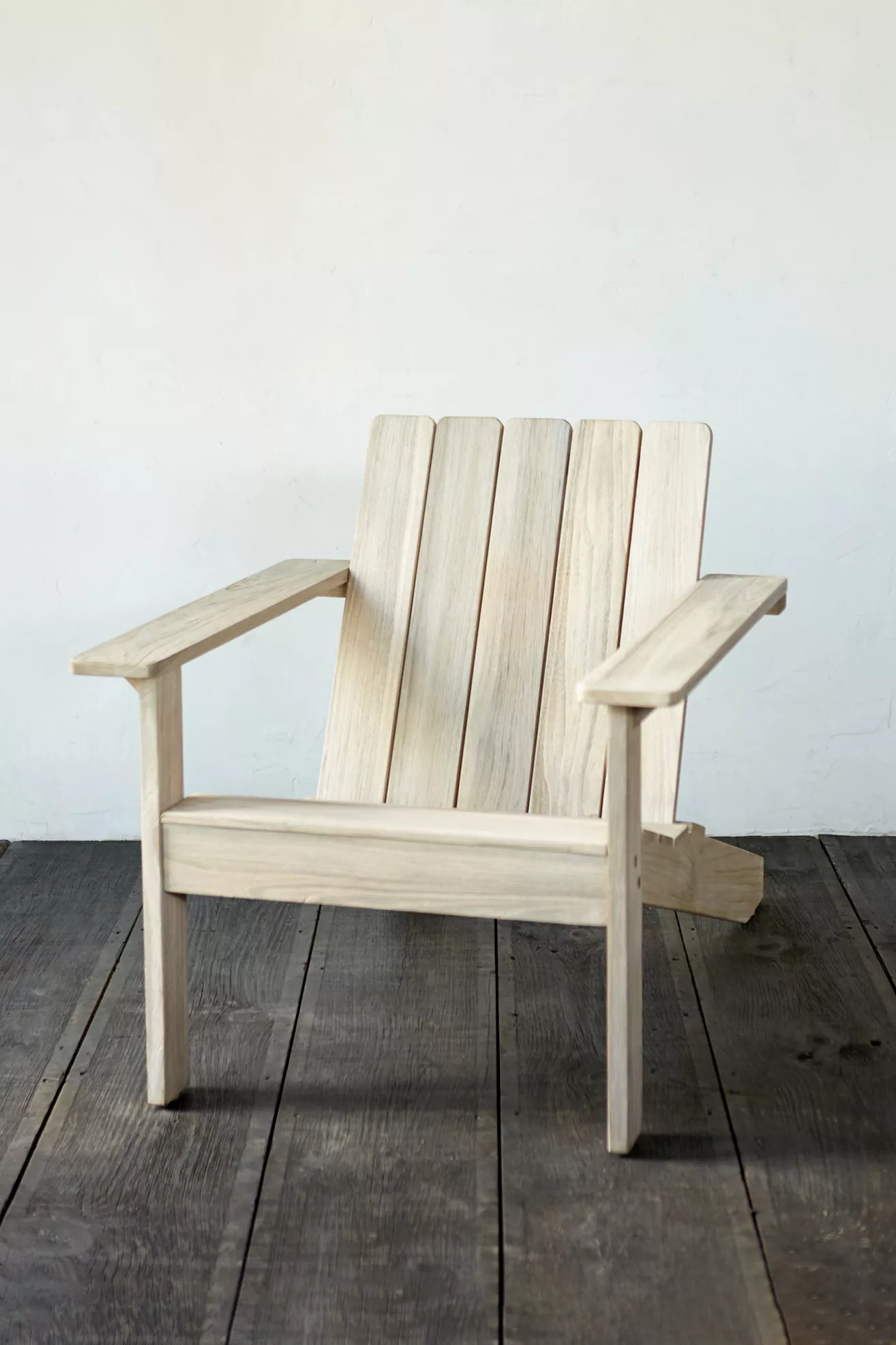 Teak Adirondack chair front view showing slats