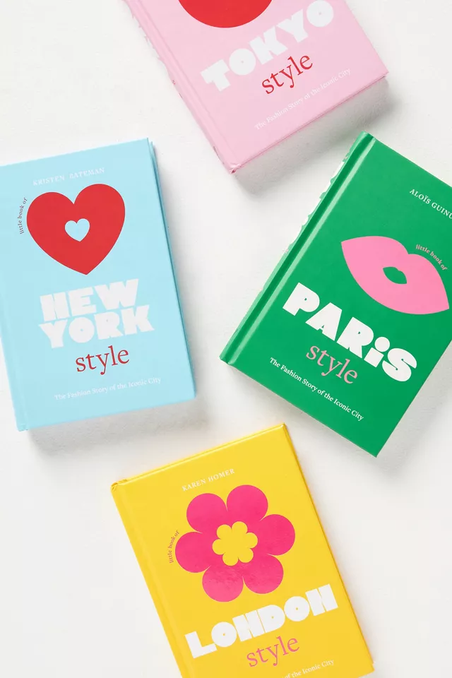 The following four books laid out on a table: Little Book of New York Style, Little Book of Paris Style, Little Book of Tokyo Style, and Little Book of London Style by Aloïs Guinut.