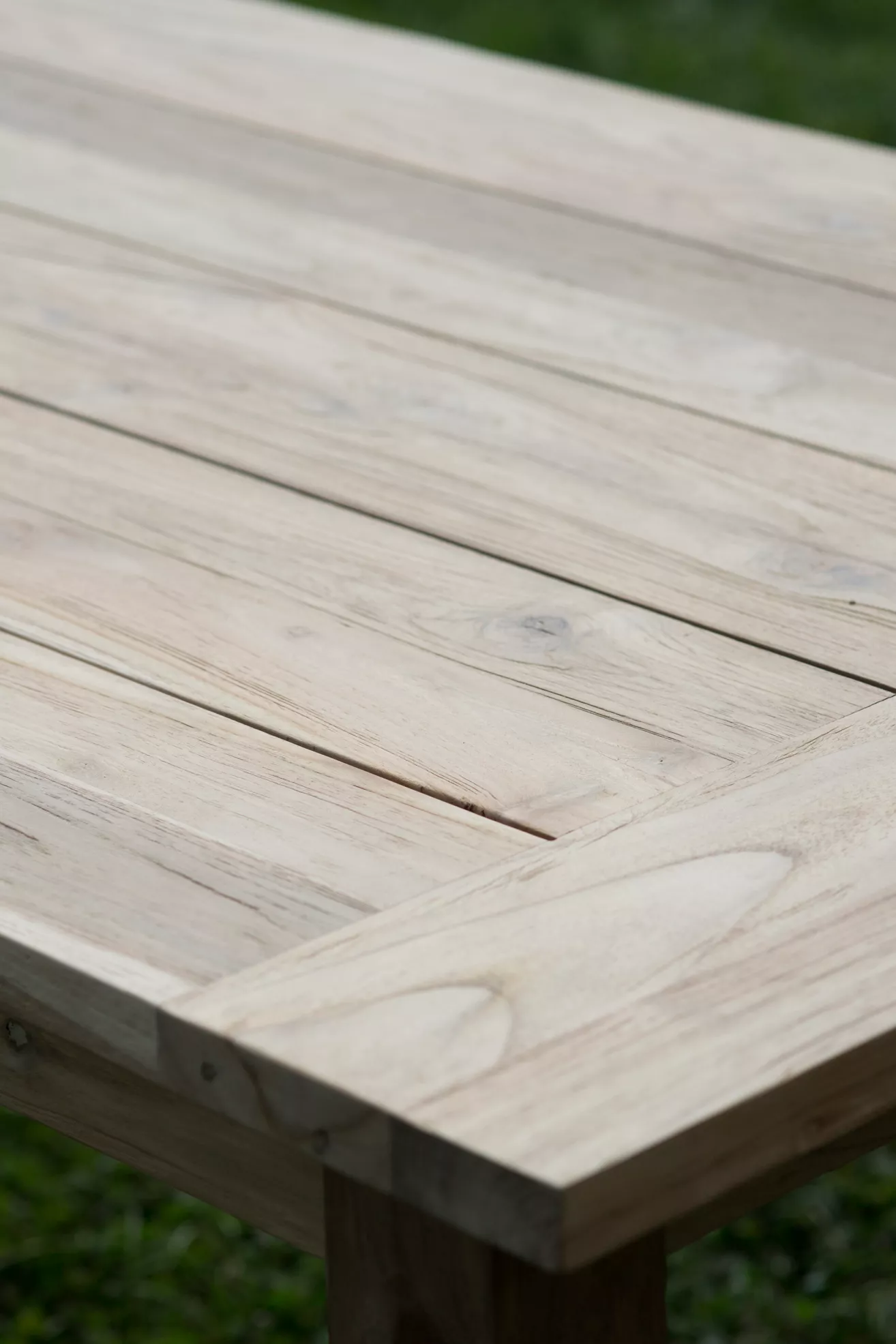 Close-up of teak table top showing wood grain