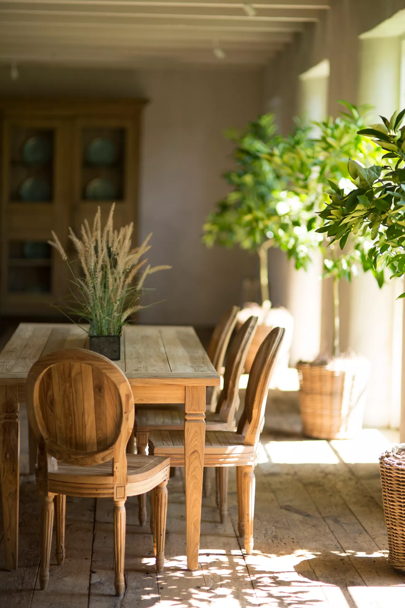 Dining room or patio with teak dining table and chairs