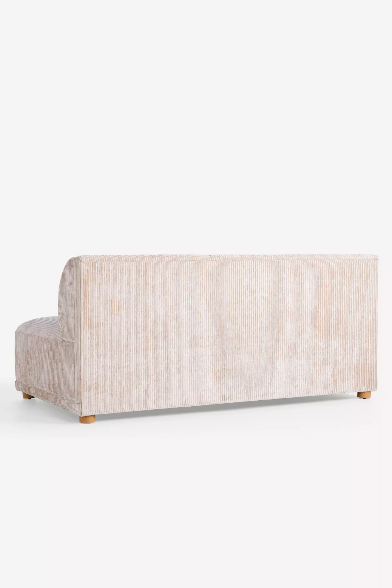 Back view of modular sofa showing built-in storage drawers in sectional pieces.