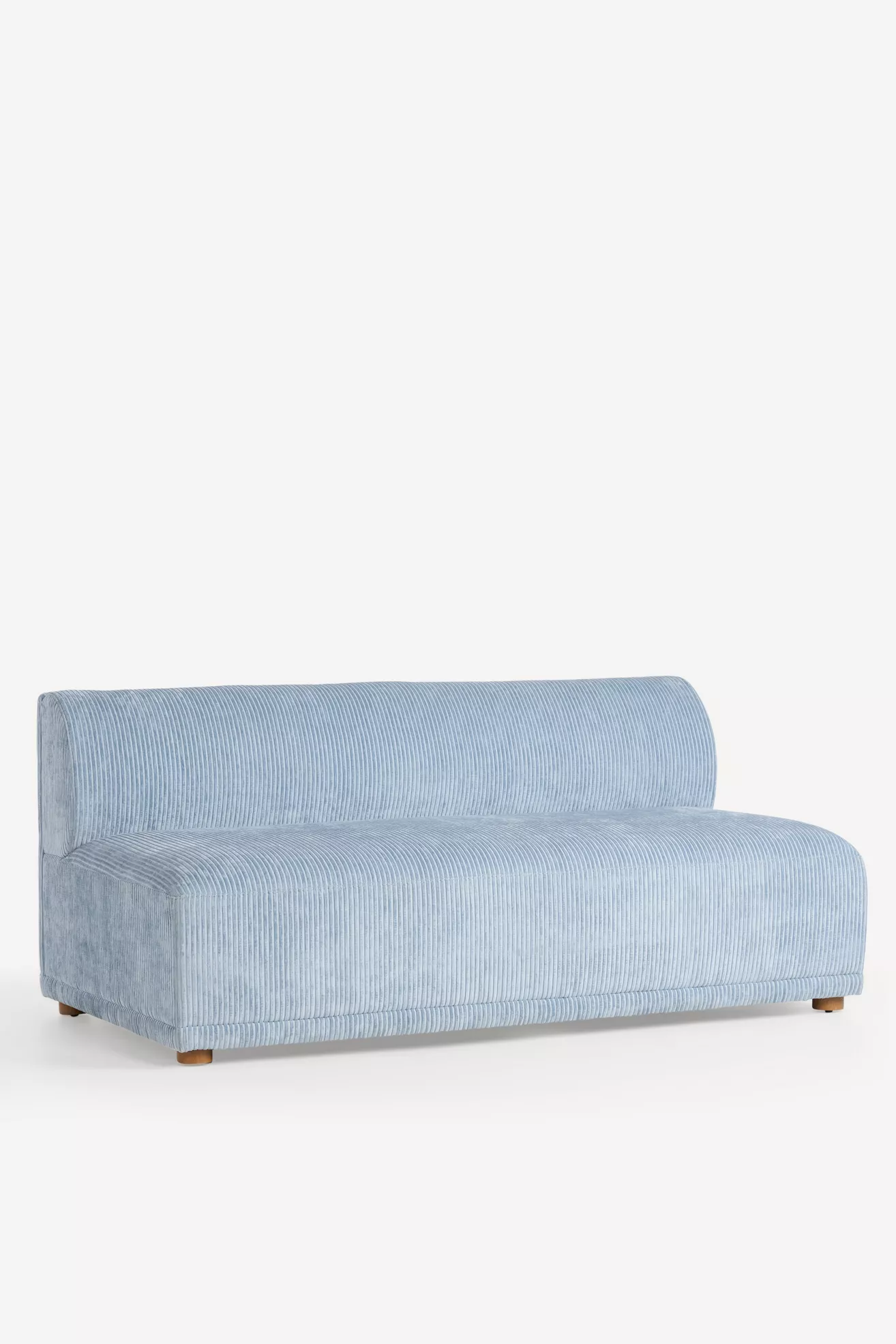 side/front view of light blue corduroy sofa with wooden feet