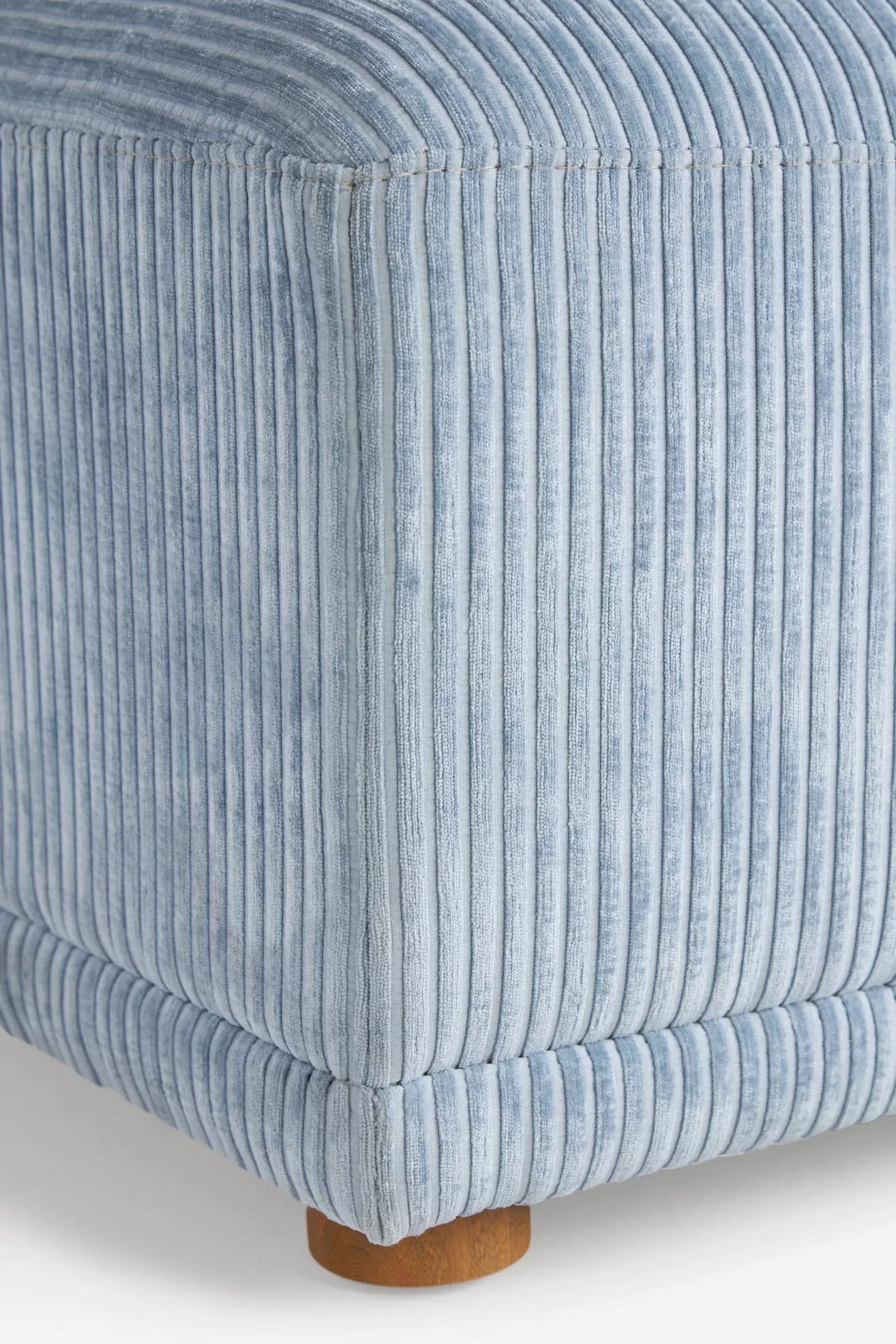 corner detail of corduroy upholstery with seam