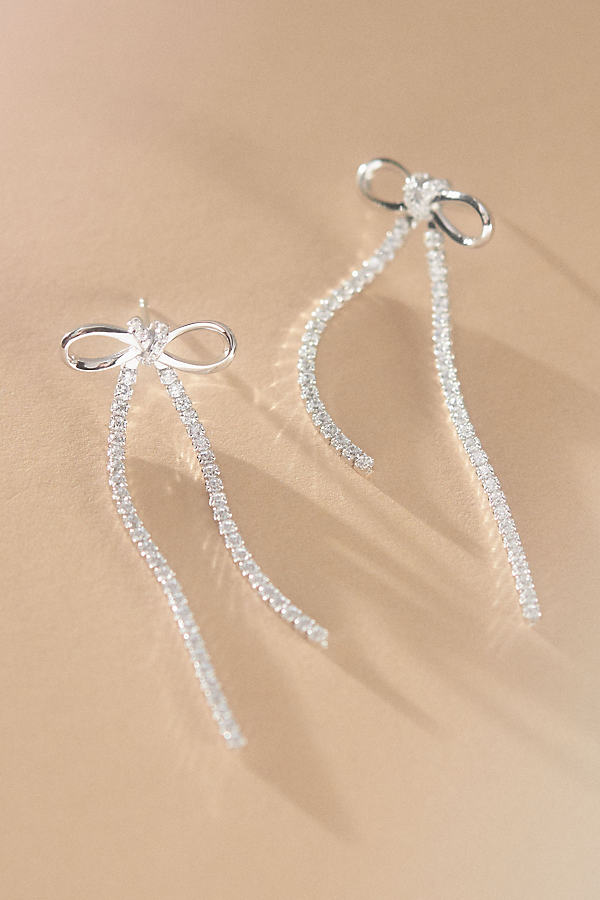 Shop Shashi Bow Earrings In Silver