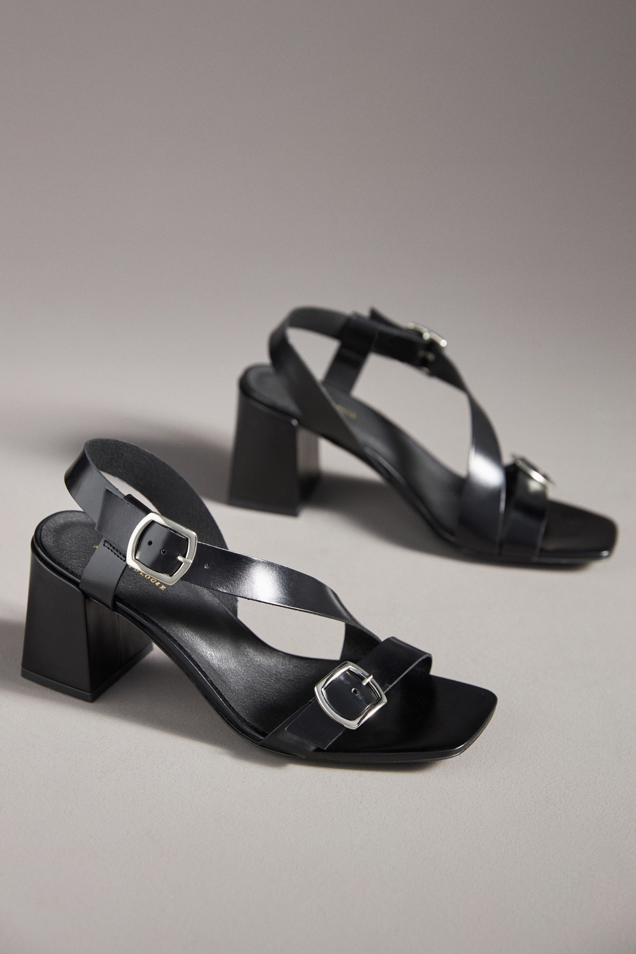 By Anthropologie Asymmetrical Buckle Heels