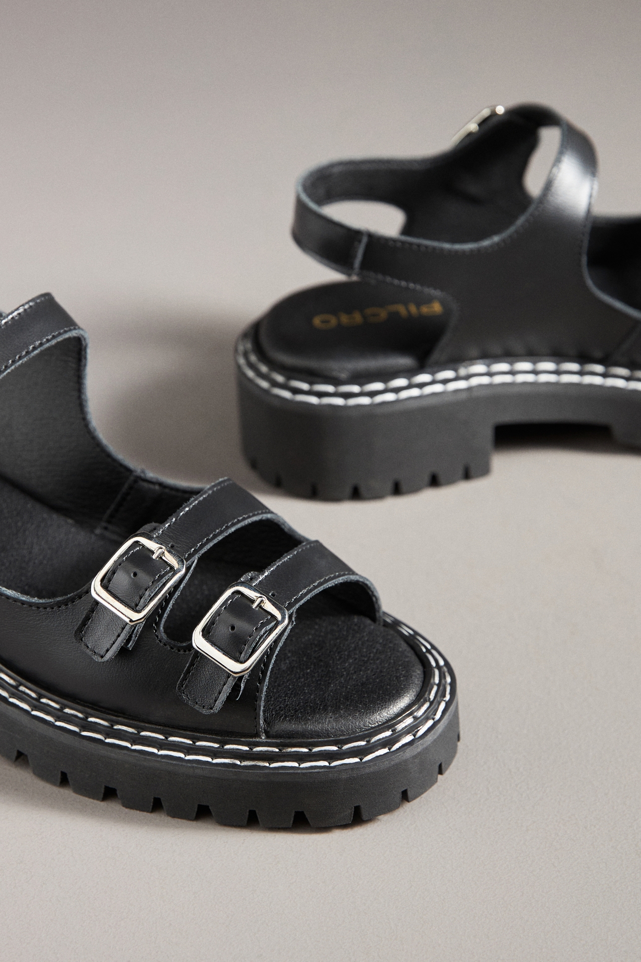 Pilcro Buckle Stompy Sandals