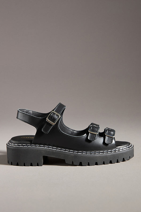 Pilcro Buckle Stompy Sandals In Black