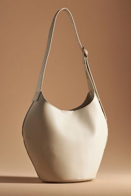 By Anthropologie Faux Leather Bucket Tote In Neutral