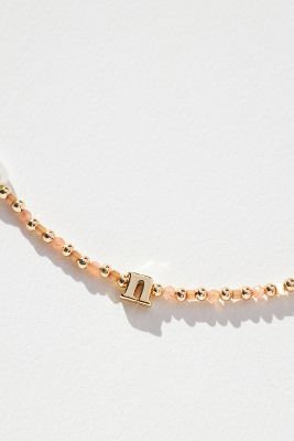 By Anthropologie Delicate Monogram Beaded Necklace In Gold