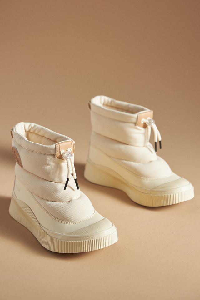 SOREL Out N About™ Puffy Zip Winter Boots #1