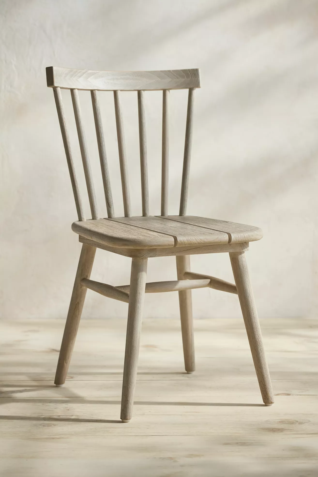 Light gray wood side chair with vertical slat back and dual slat seat