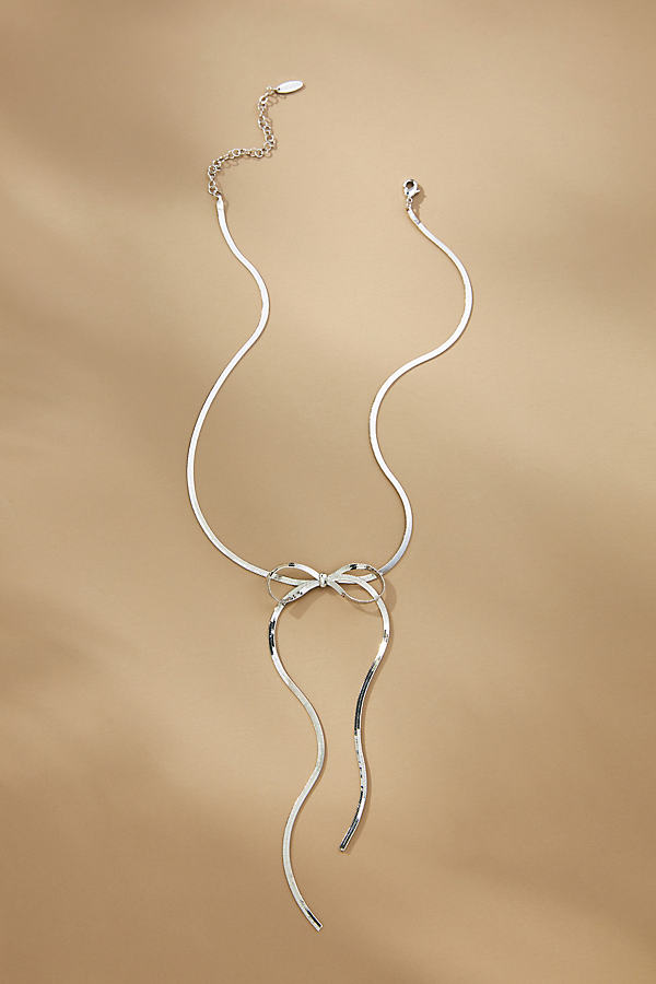 By Anthropologie Bow Chain Necklace In Metallic