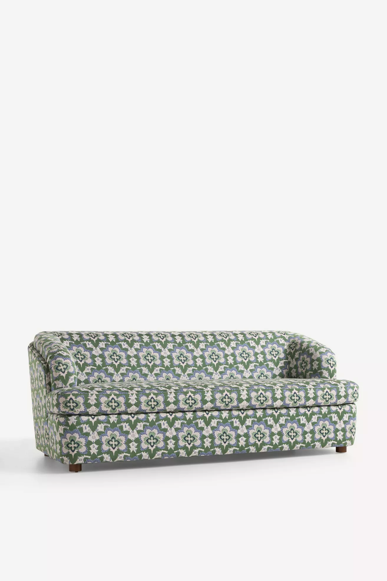 Side view of the green floral sleeper sofa