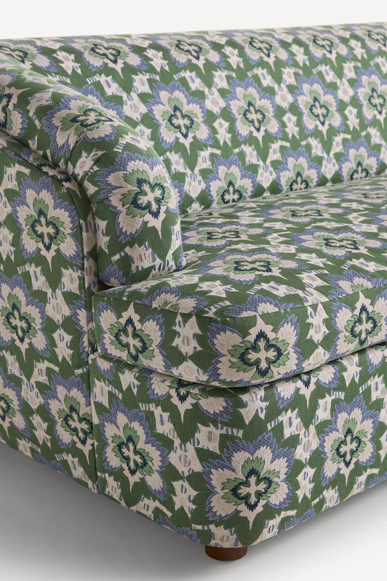 Close-up of the green floral jacquard fabric pattern
