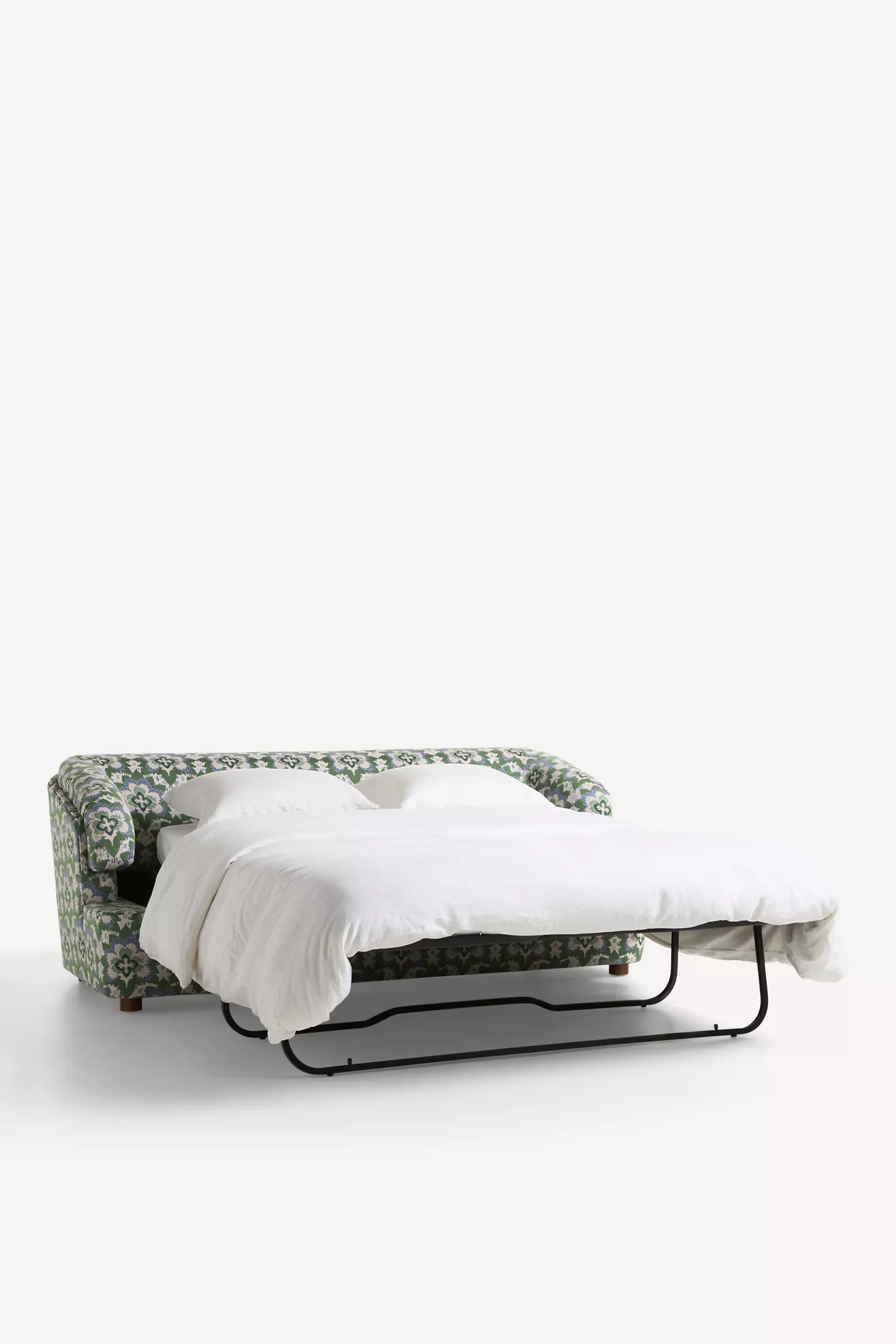 Sofa converted to a sleeper with metal bed frame visible