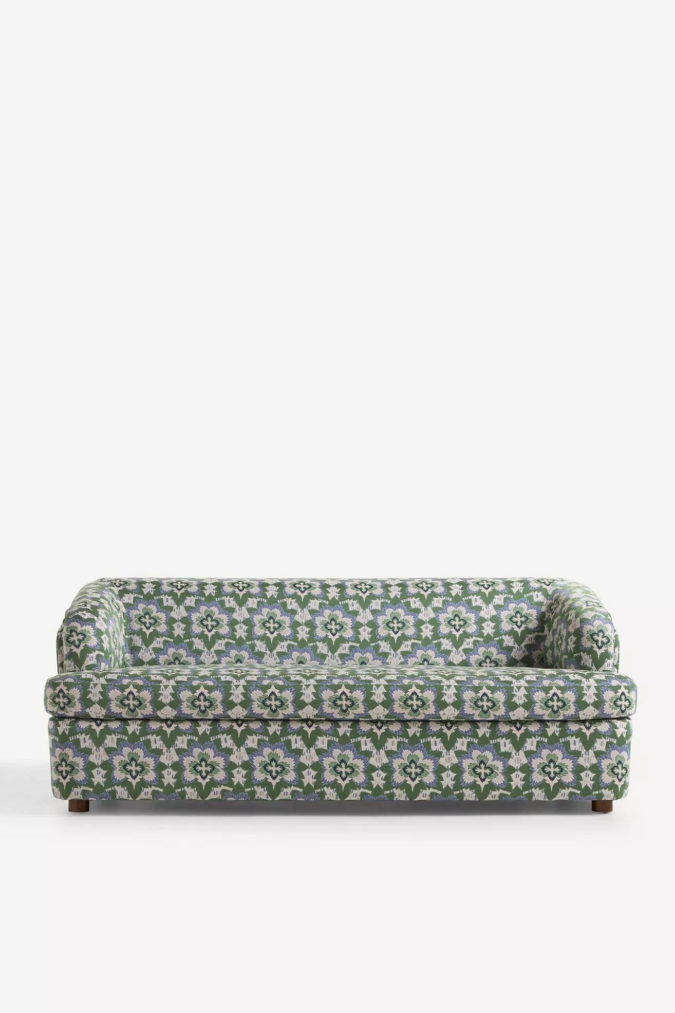 Front view of green patterned sleeper sofa