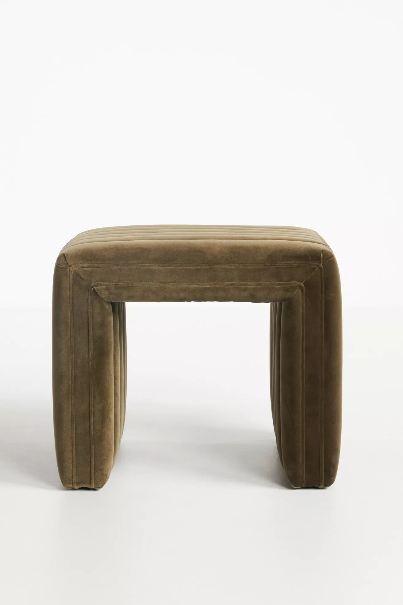 Velvet ottoman from the side angle