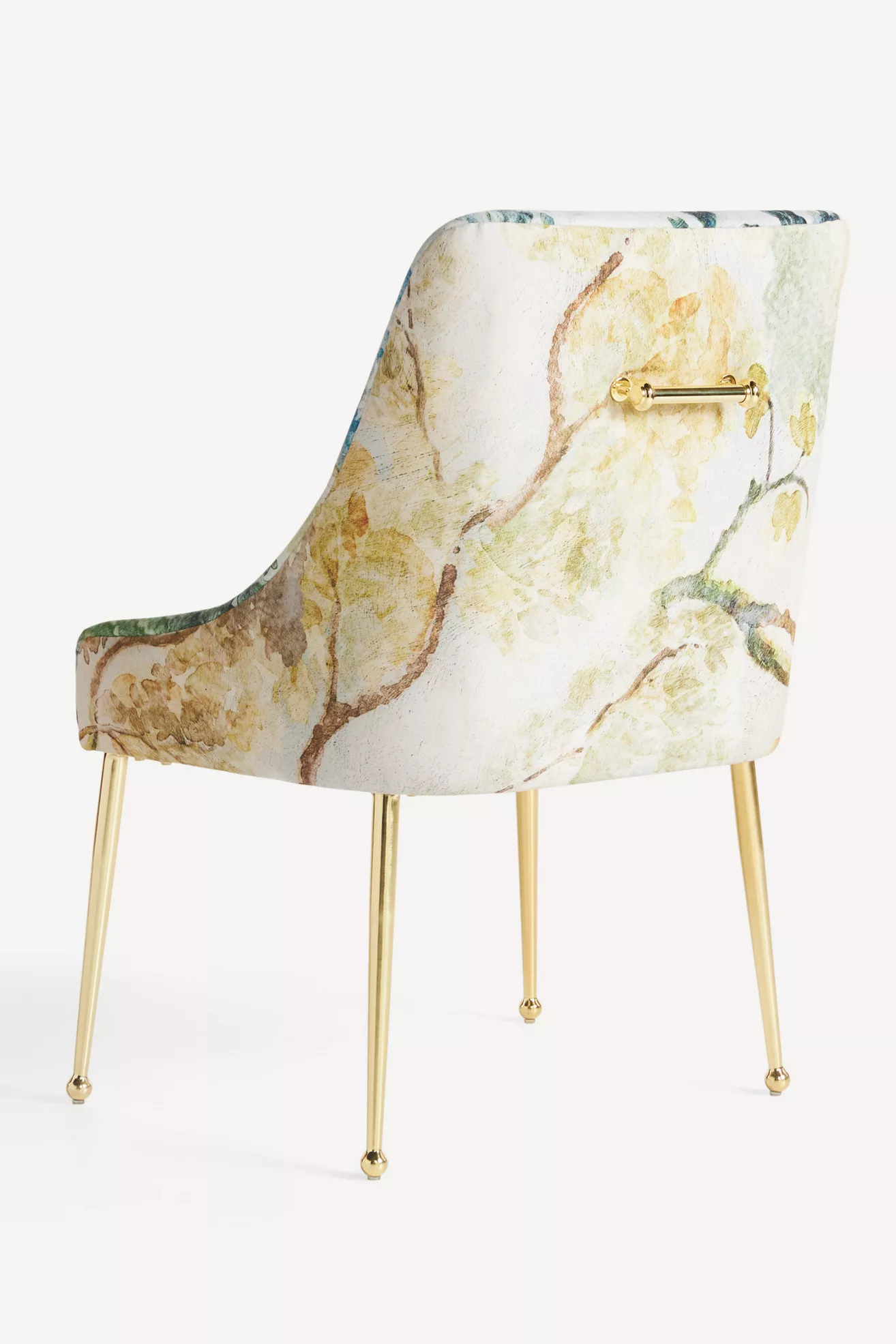 Back-left angle of Judarn Elowen chair showing back tassel/handle and print