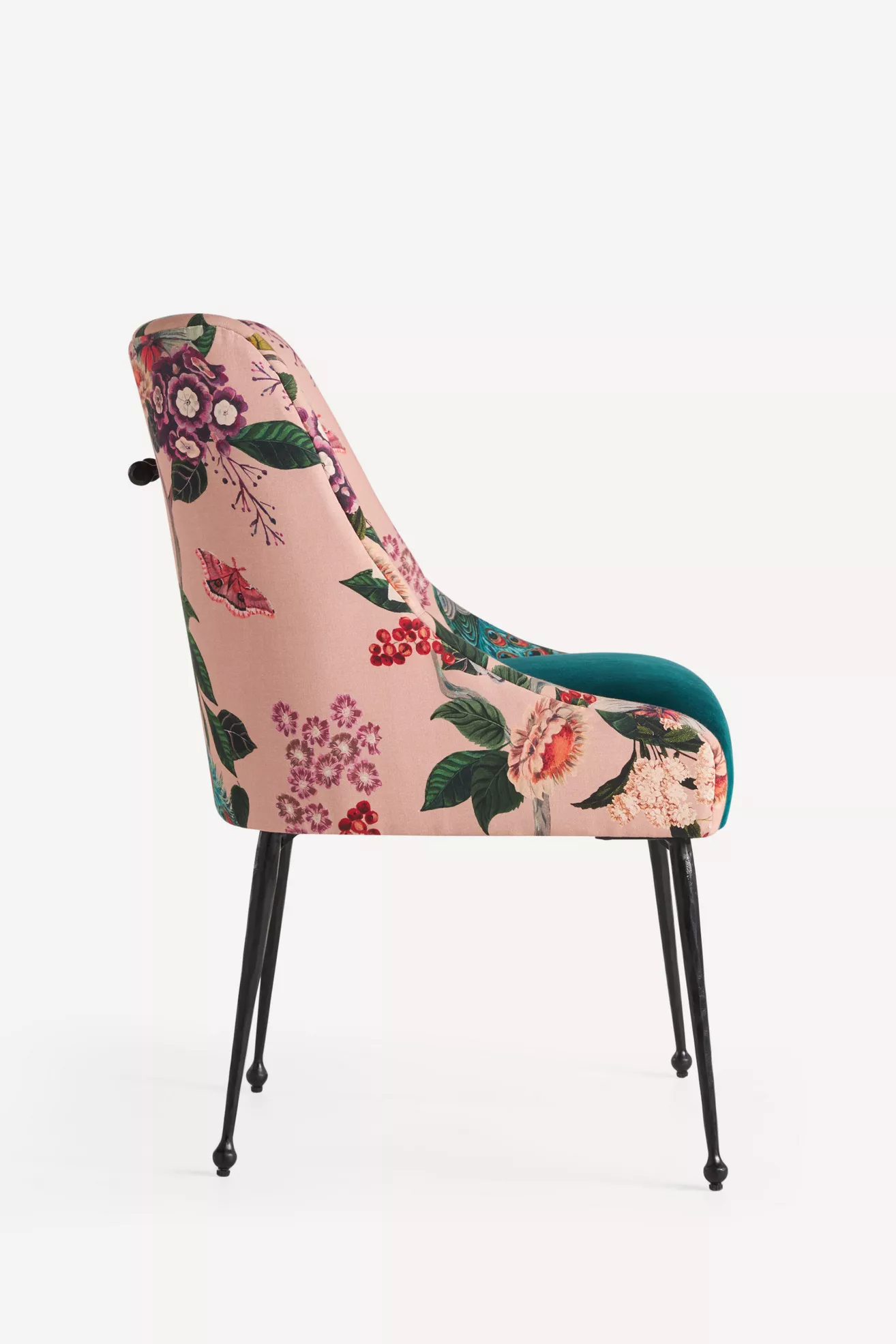 Profile view of floral armchair