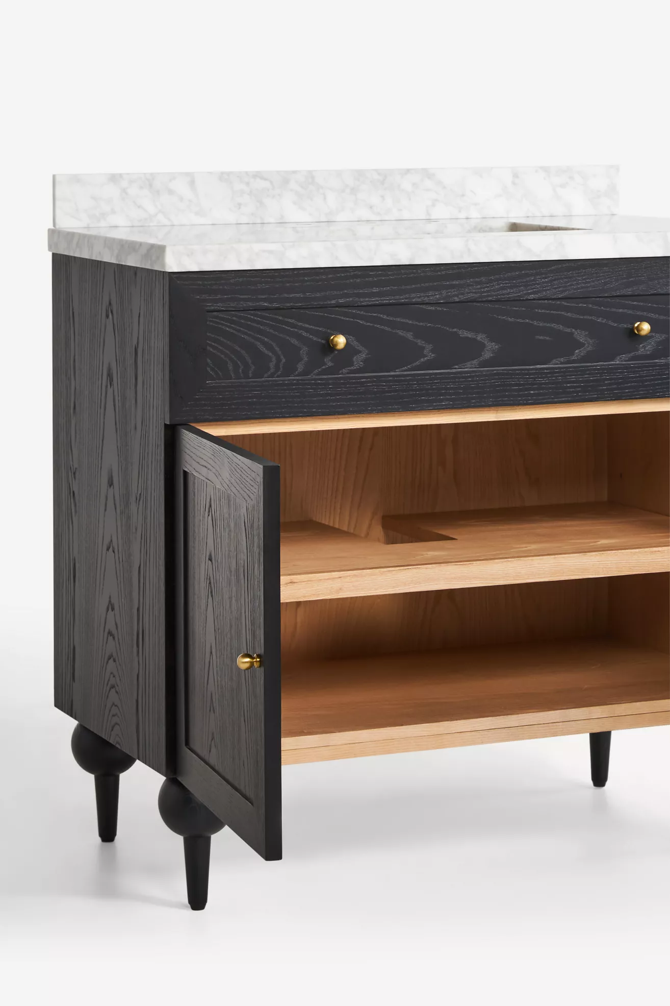 Open cabinet showing inner wood shelf