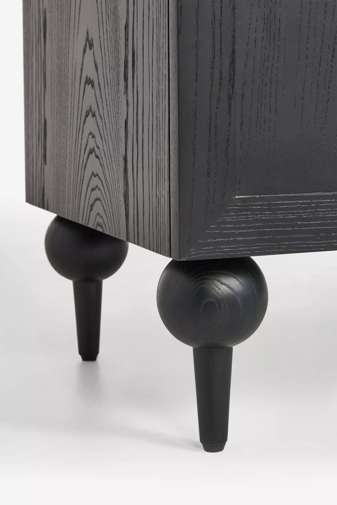 Wood grain and leg detail of vanity leg