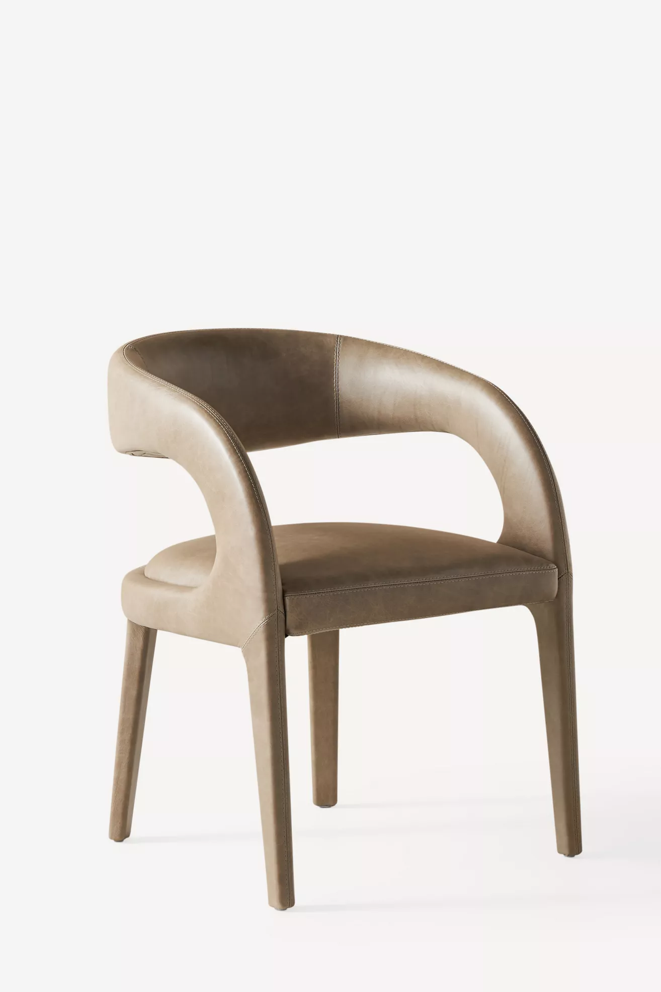 Leather Hagen dining chair side view curved back and armrest