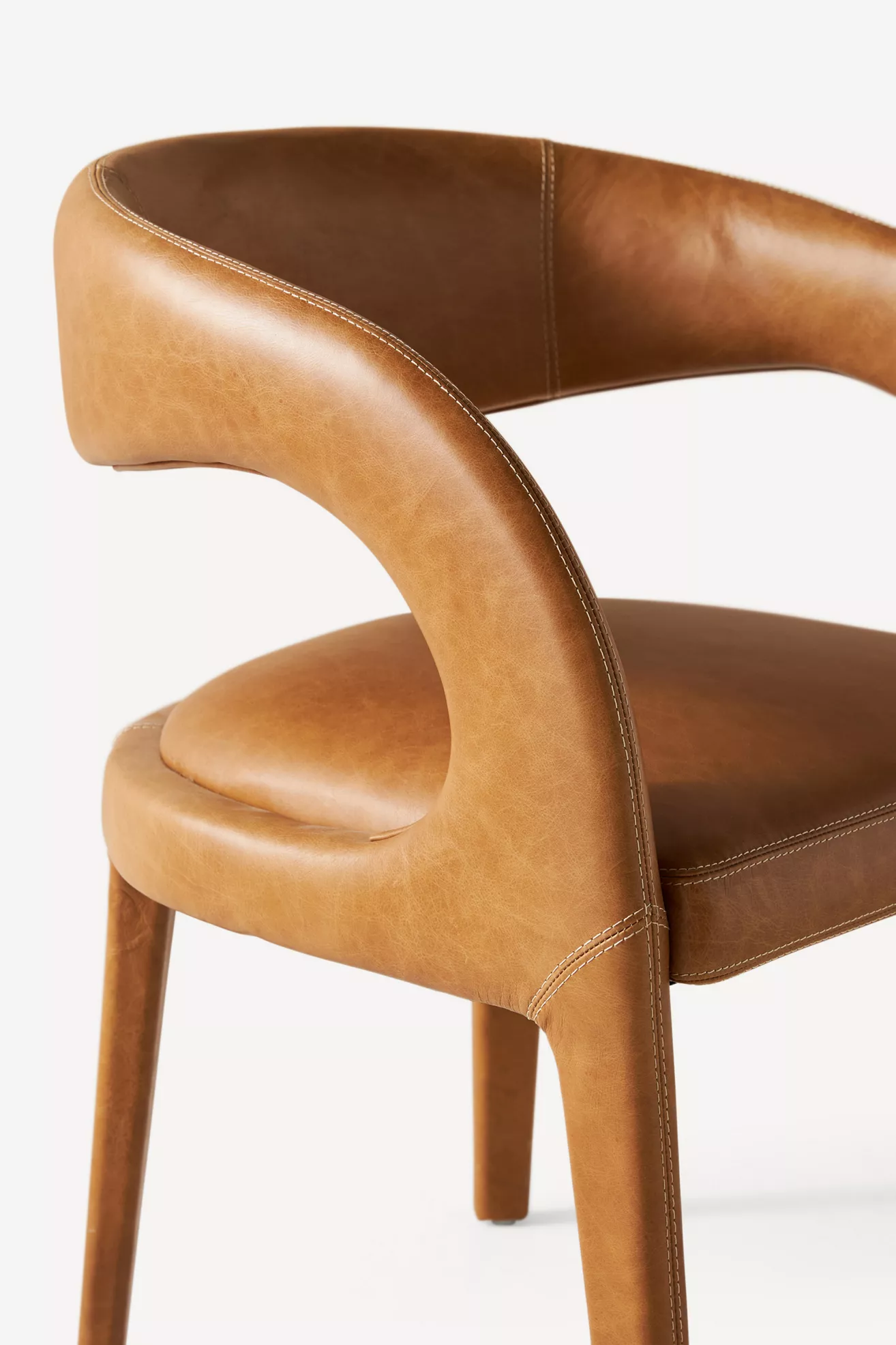 Close-up of chair back and arm stitching