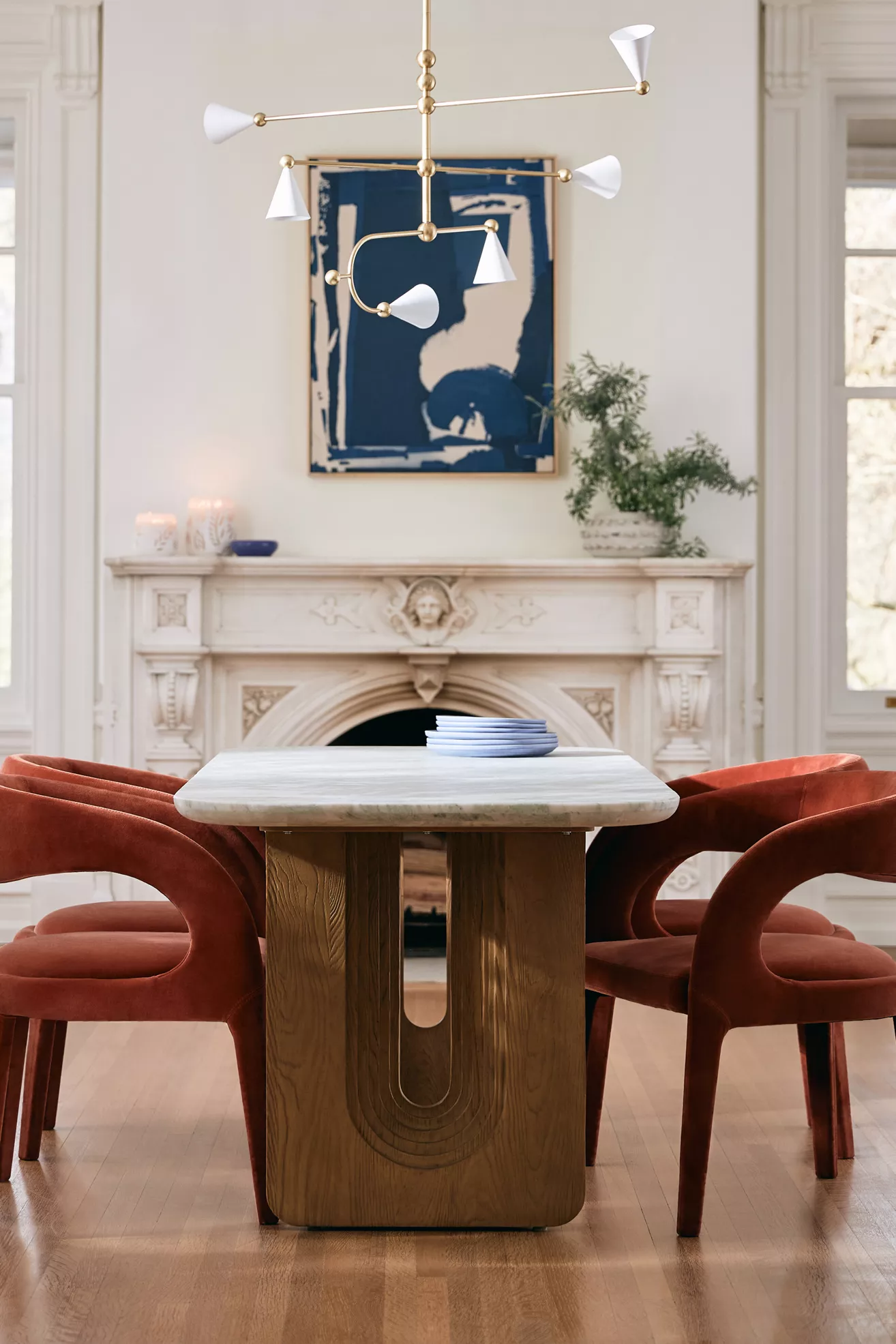 Velvet Hagen dining chairs around a dining table in a formal room