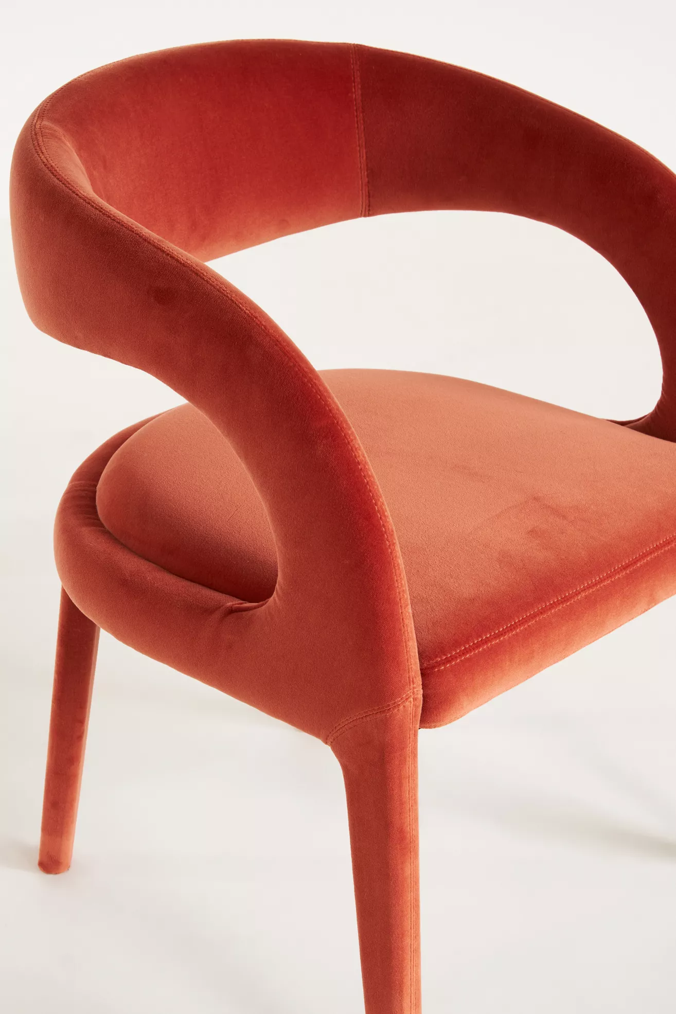 Close-up of seat and arm joint on Velvet Hagen dining chair
