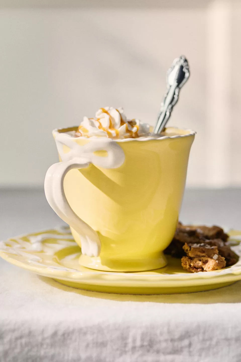 Anthropologie Benedita Bow Stoneware Mug — cute bow detail stoneware mug for aesthetic hot drinks