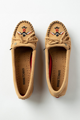 Shop Minnetonka Thunderbird Animikii Moccasins In Beige