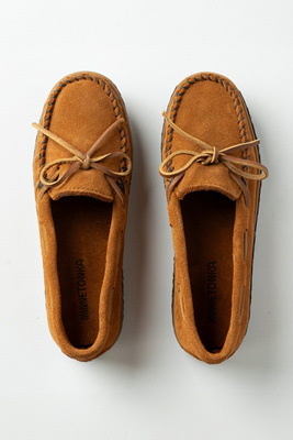 Shop Minnetonka Tie Tread Moccasins In Brown