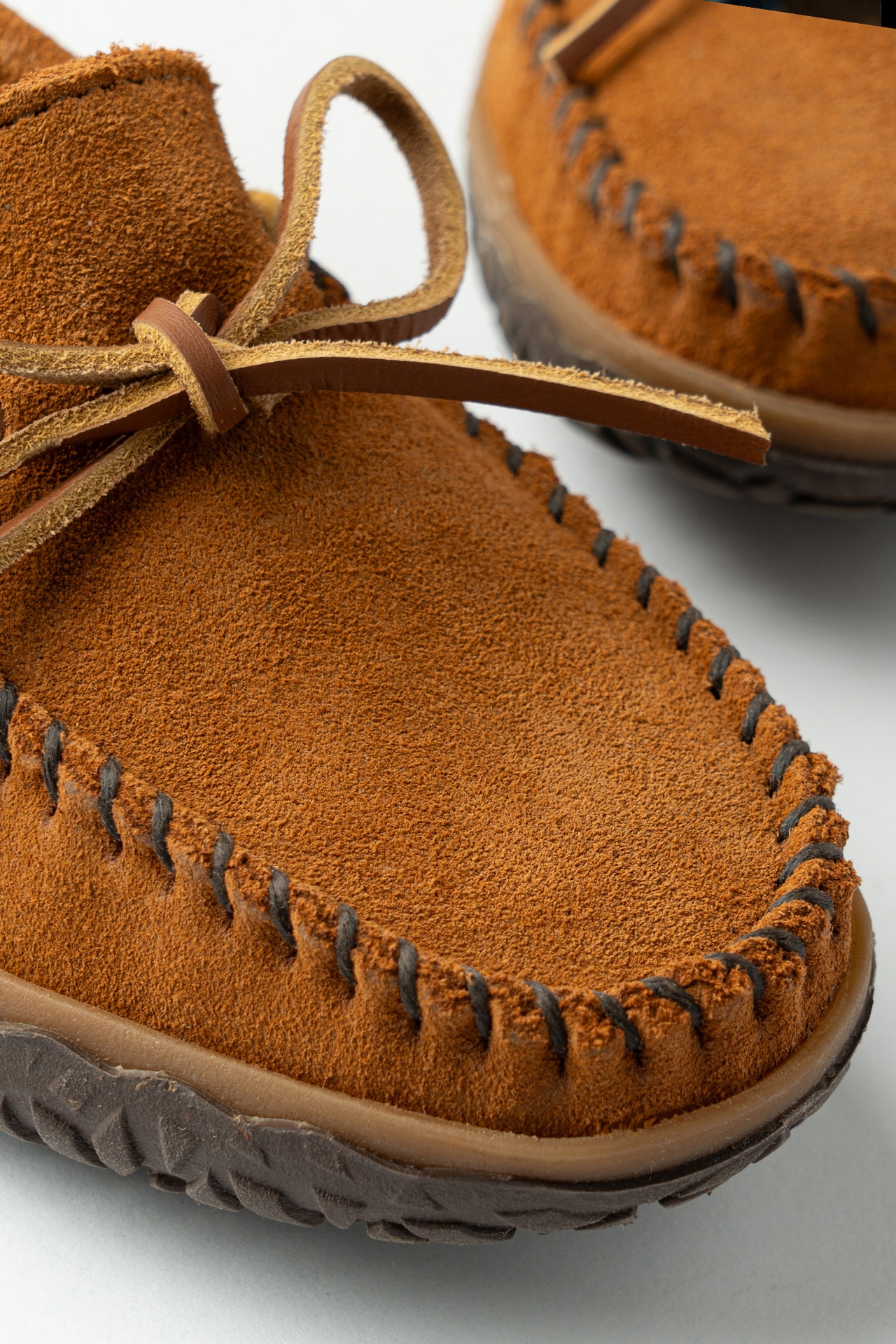 Minnetonka Tie Tread Moccasins