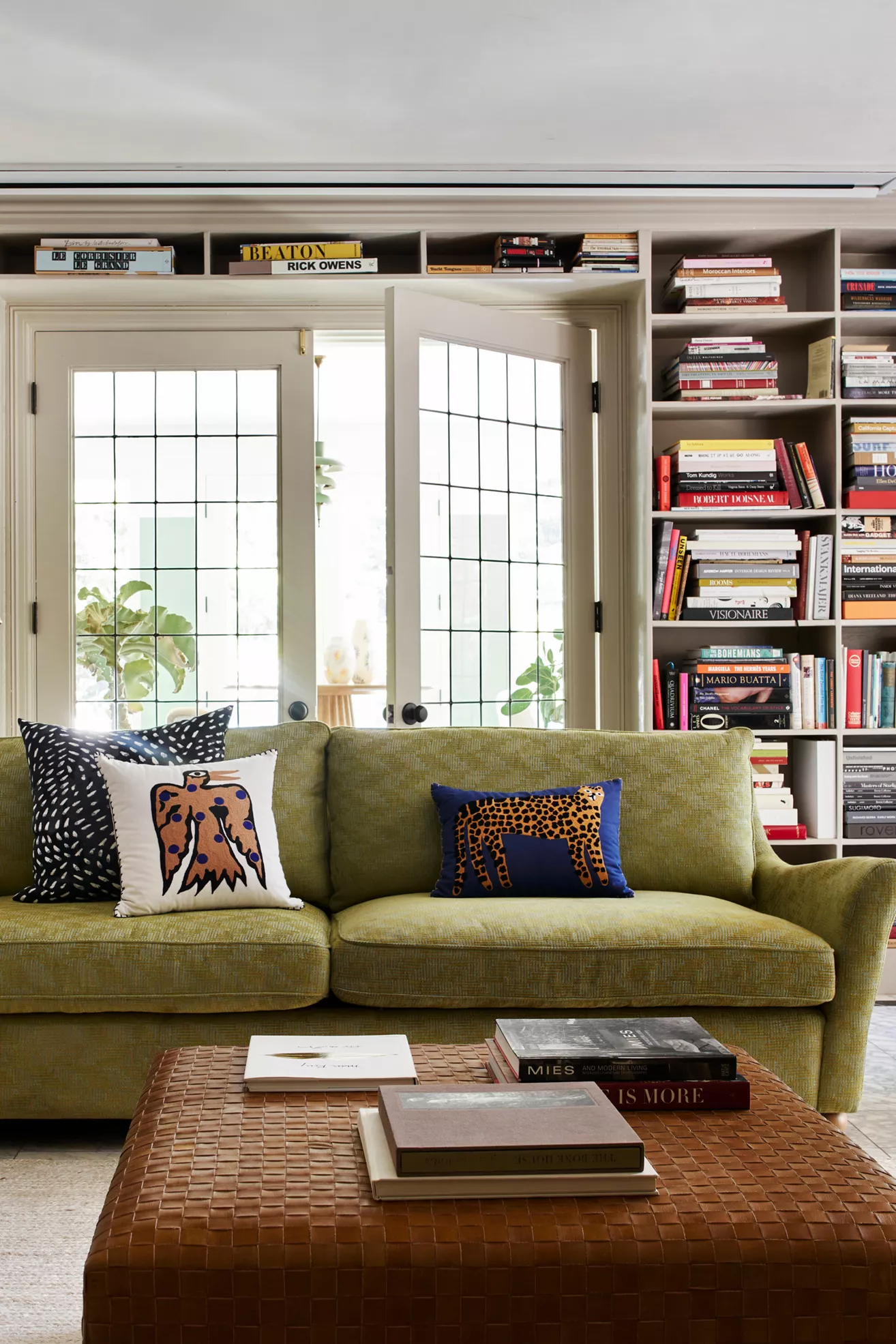 woven leather ottoman on living room coffee table