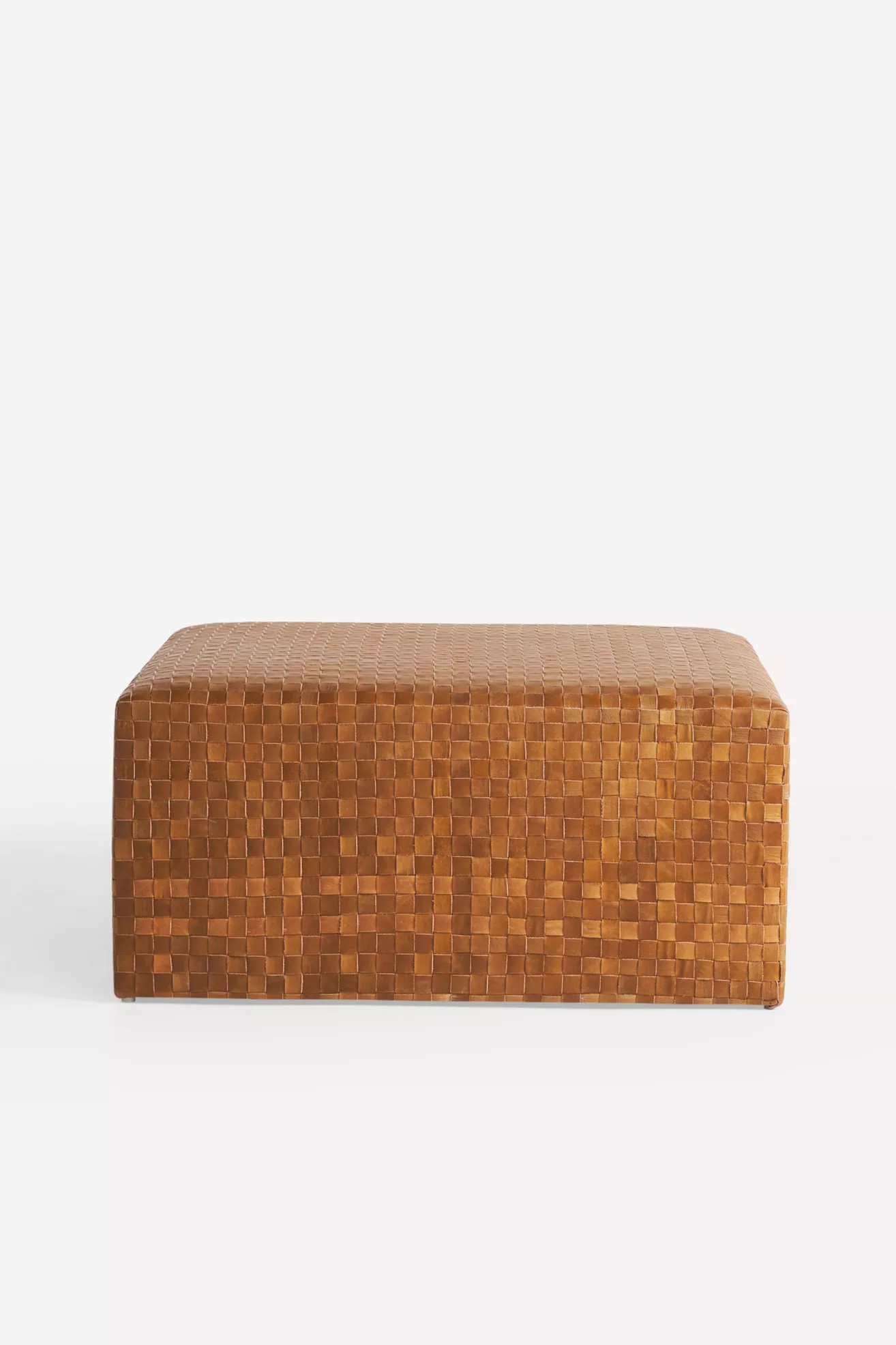 front-right view of woven leather ottoman