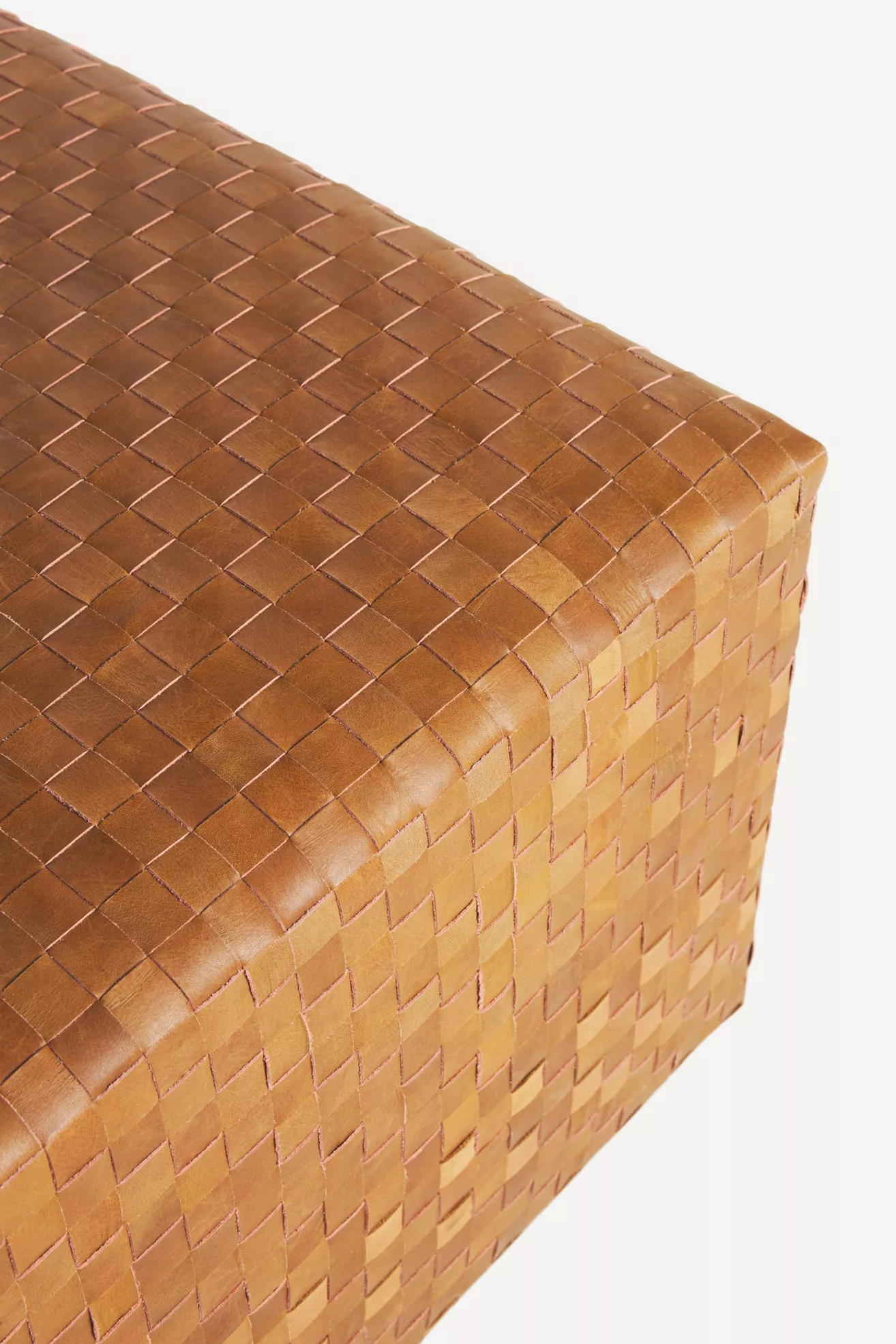 close-up of woven leather squares