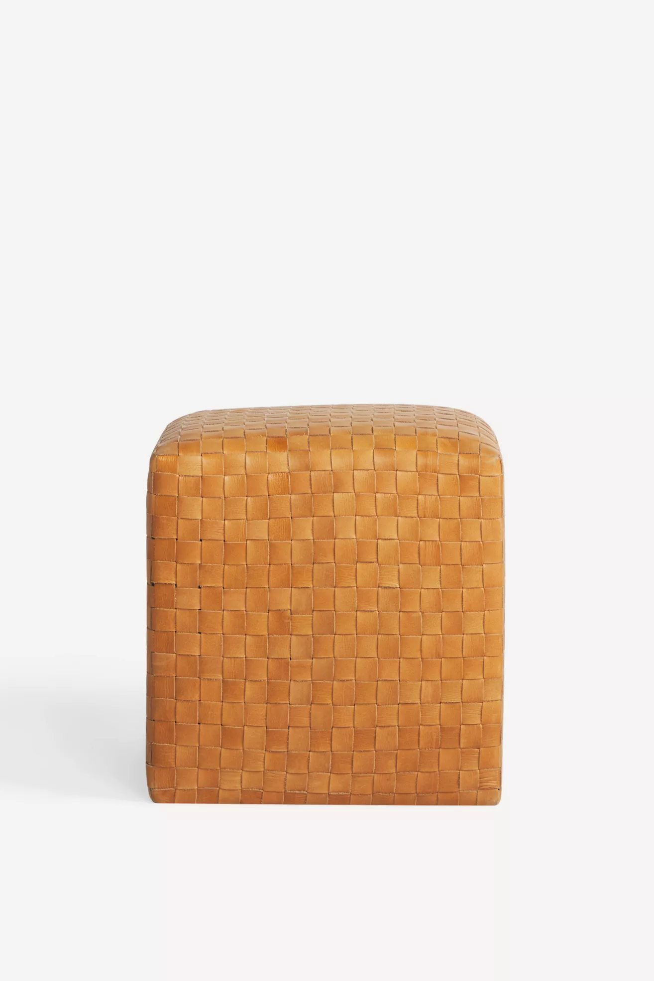 woven tan leather ottoman close-up