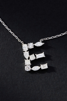 By Anthropologie White Gold Diamond Monogram Necklace In Multicolor