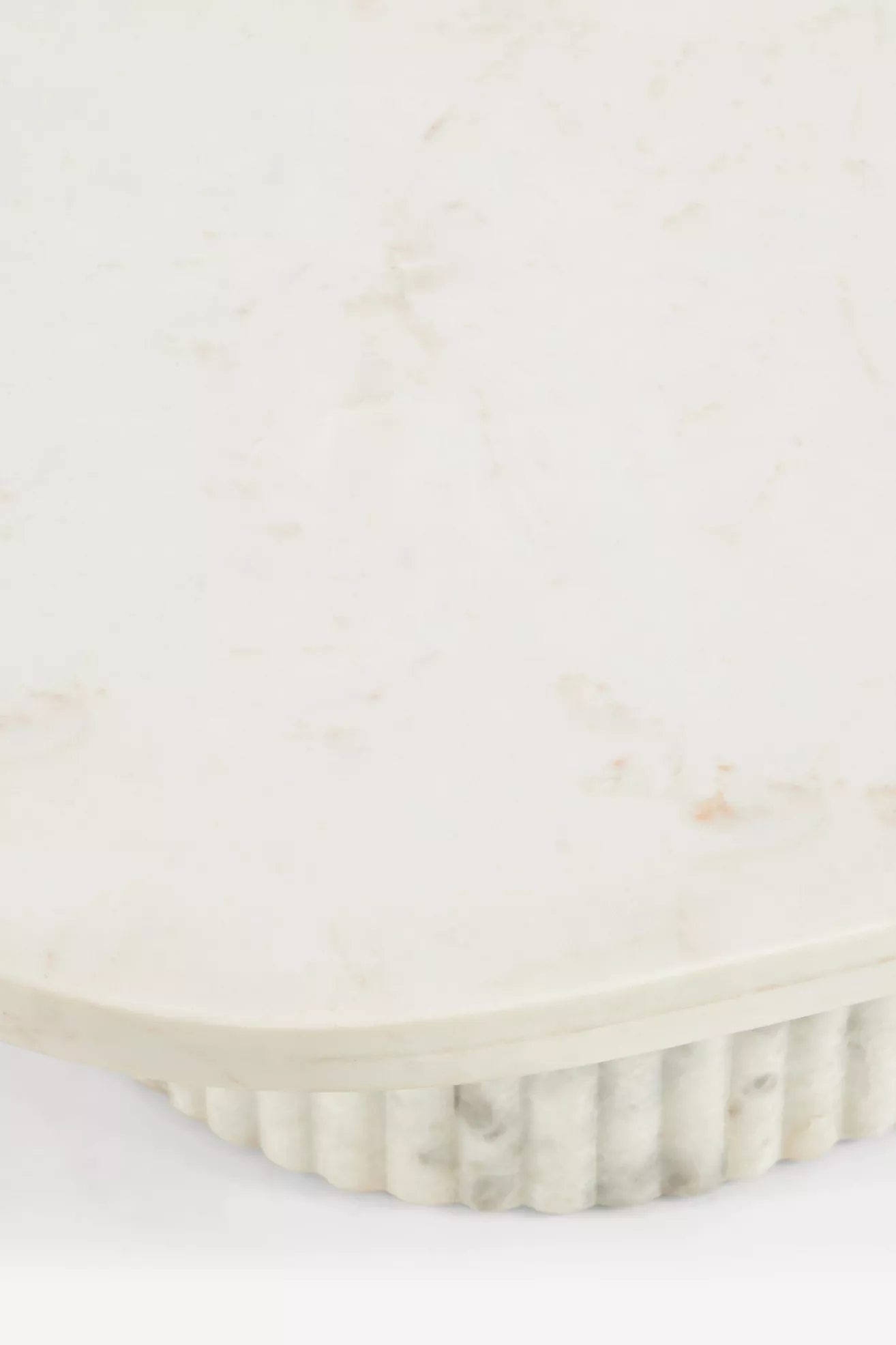 Edge and base of marble coffee table
