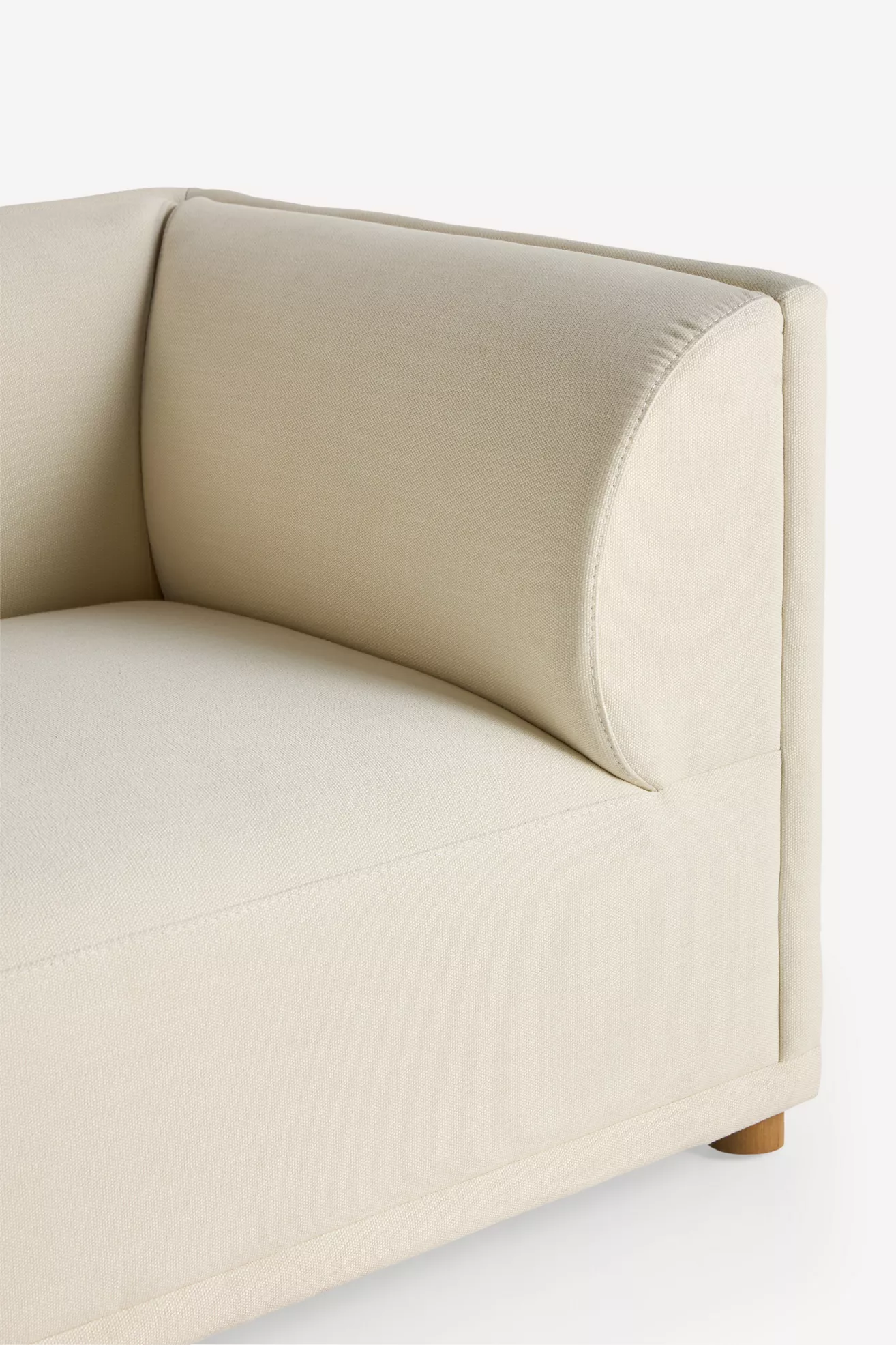 Close-up of armrest and cushion edge