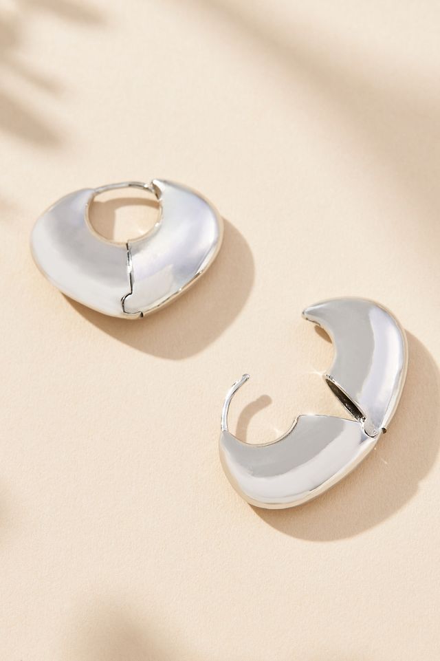 Wide Huggie Hoop Earrings by Anthropologie in Silver