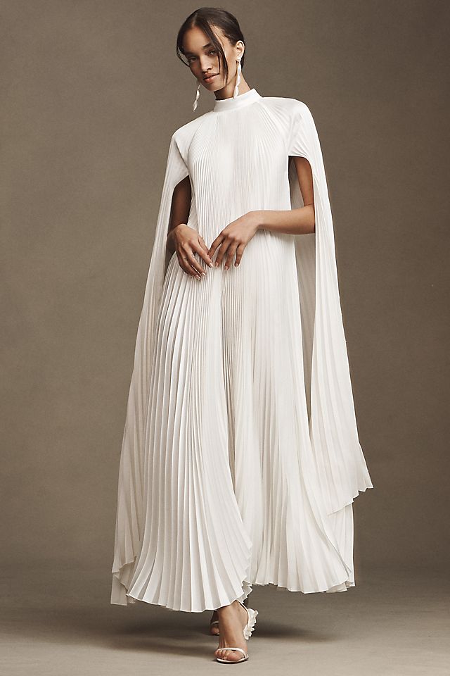 pleated cape dress Waist-Cinching Long-Sleeve Maxi Aurohaya making shape that doesnt play it safe Designed to command attention from every angle 95% polyester L'IDE Eiffel Cape Pleated Maxi