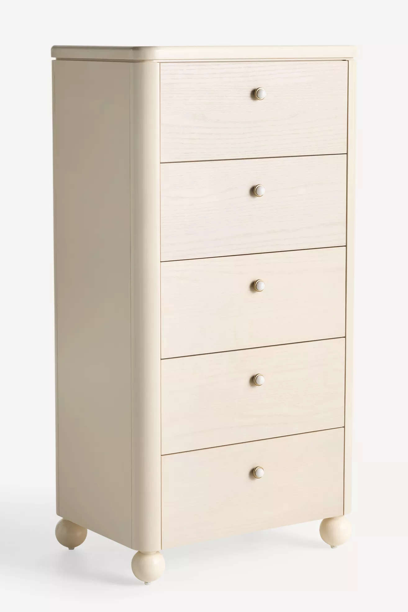 Five-drawer dresser in ivory finish with rounded knobs